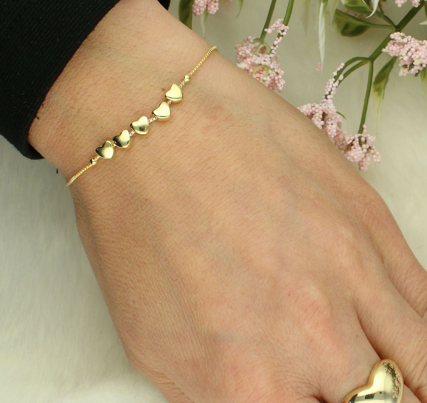 Bransoletka damska srebrna pozłacana z sercami Armonica Nomination 241303 006.png